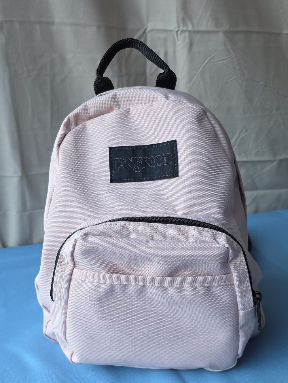 Jansport Mini Pint Backpack in Pale Misty Pink